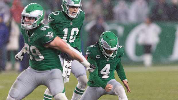 Philadelphia Eagles kicker Jake Elliott (4) pumps a fist after making an improbable 59-yard field goal in the wind and rain to send the Week 12 game against the Buffalo Bills into overtime, where Philly won, 37-34